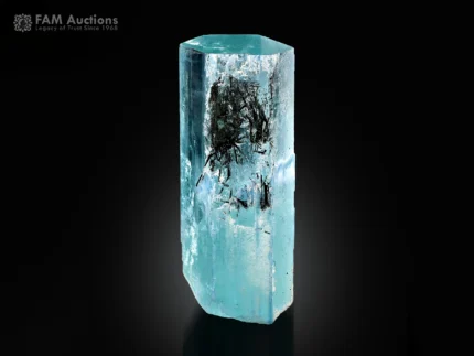 Blue aquamarine crystal with black schorl spray inclusions from Pakistan