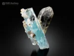 Blue aquamarine crystal with smoky quartz and albite from Pakistan