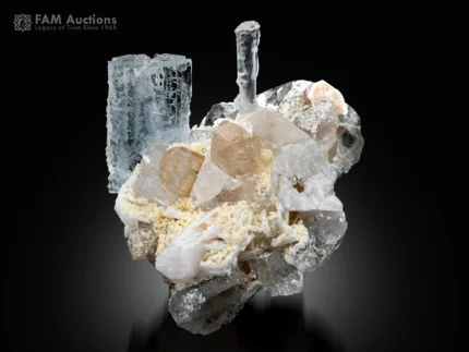 Pale blue aquamarine with topaz, quartz, and white albite from Pakistan.