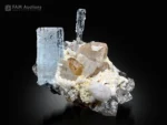 Pale blue aquamarine with topaz, quartz, and white albite from Pakistan.