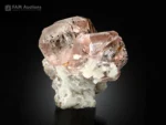 Gem-quality pink and colorless bicolor fluorite with albite from Pakistan