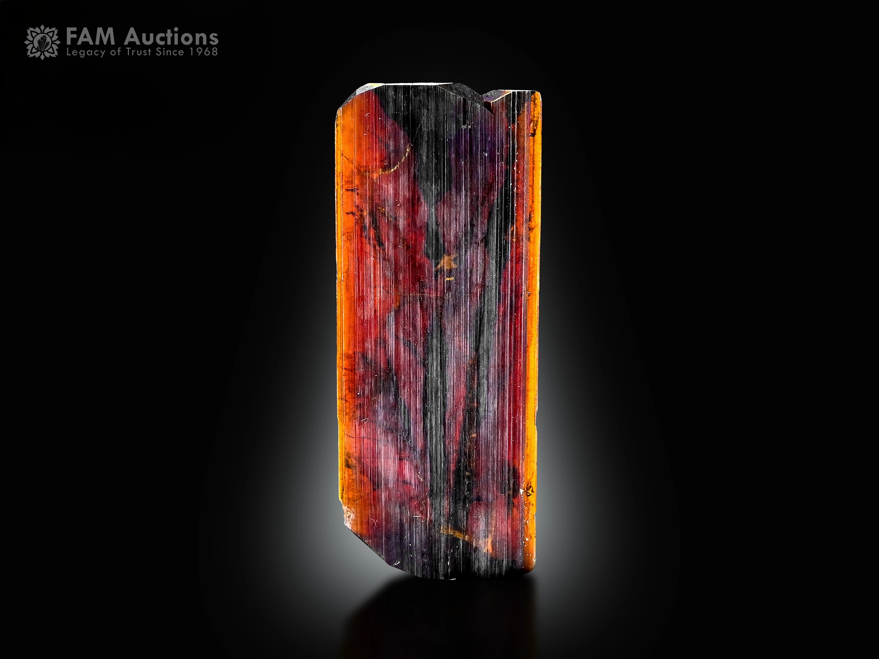 Fiery Red Brookite Crystal Pakistan Fiery red brookite crystal with phantom inclusions from Pakistan.