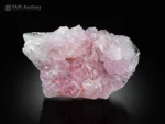 Pink rose quartz cluster with crystallized form and superb luster.