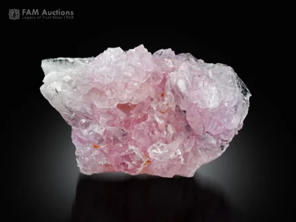 Pink rose quartz cluster with crystallized form and superb luster.