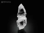 Clear quartz crystal displaying a scepter habit and superb transparency
