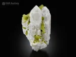 Green tourmaline crystals with sharply terminated quartz crystals on matrix from Pakistan