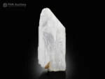 White viitaniemiite crystal with elongated form and natural striations from Pakistan.