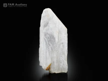 White viitaniemiite crystal with elongated form and natural striations from Pakistan.