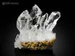 Transparent quartz crystal cluster with sharp terminations and excellent luster.