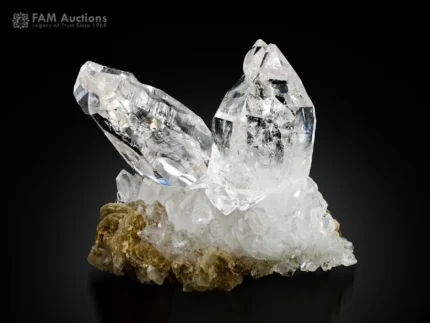Transparent quartz crystal cluster with sharp terminations and excellent luster.