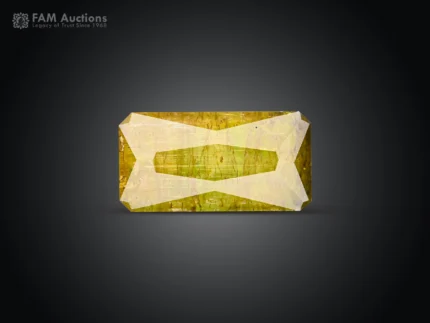 4.95 carat yellowish-green baguette cut tourmaline from Pakistan.