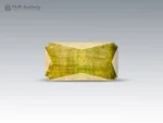 4.95 carat yellowish-green baguette cut tourmaline from Pakistan.