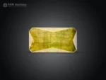 4.95 carat yellowish-green baguette cut tourmaline from Pakistan.