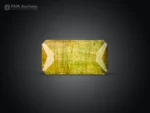 4.95 carat yellowish-green baguette cut tourmaline from Pakistan.