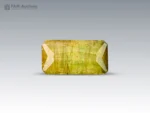 4.95 carat yellowish-green baguette cut tourmaline from Pakistan.