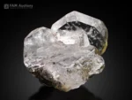 Gemmy apatite crystal cluster with subtle pinkish hue and superb luster