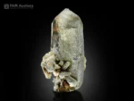 Chlorite included quartz crystal with green inclusions and sharp termination.