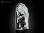 Elongated hematite specimen with superb metallic luster and reflective surfaces