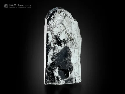 Elongated hematite specimen with superb metallic luster and reflective surfaces