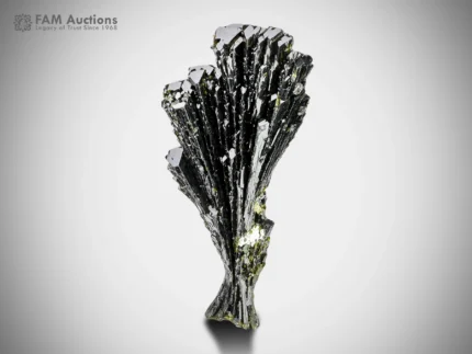 Epidote tree with deep green elongated crystals and superb luster.