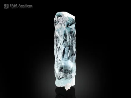 Fine blue etched aquamarine crystal with intricate natural surface patterns and bright luster.