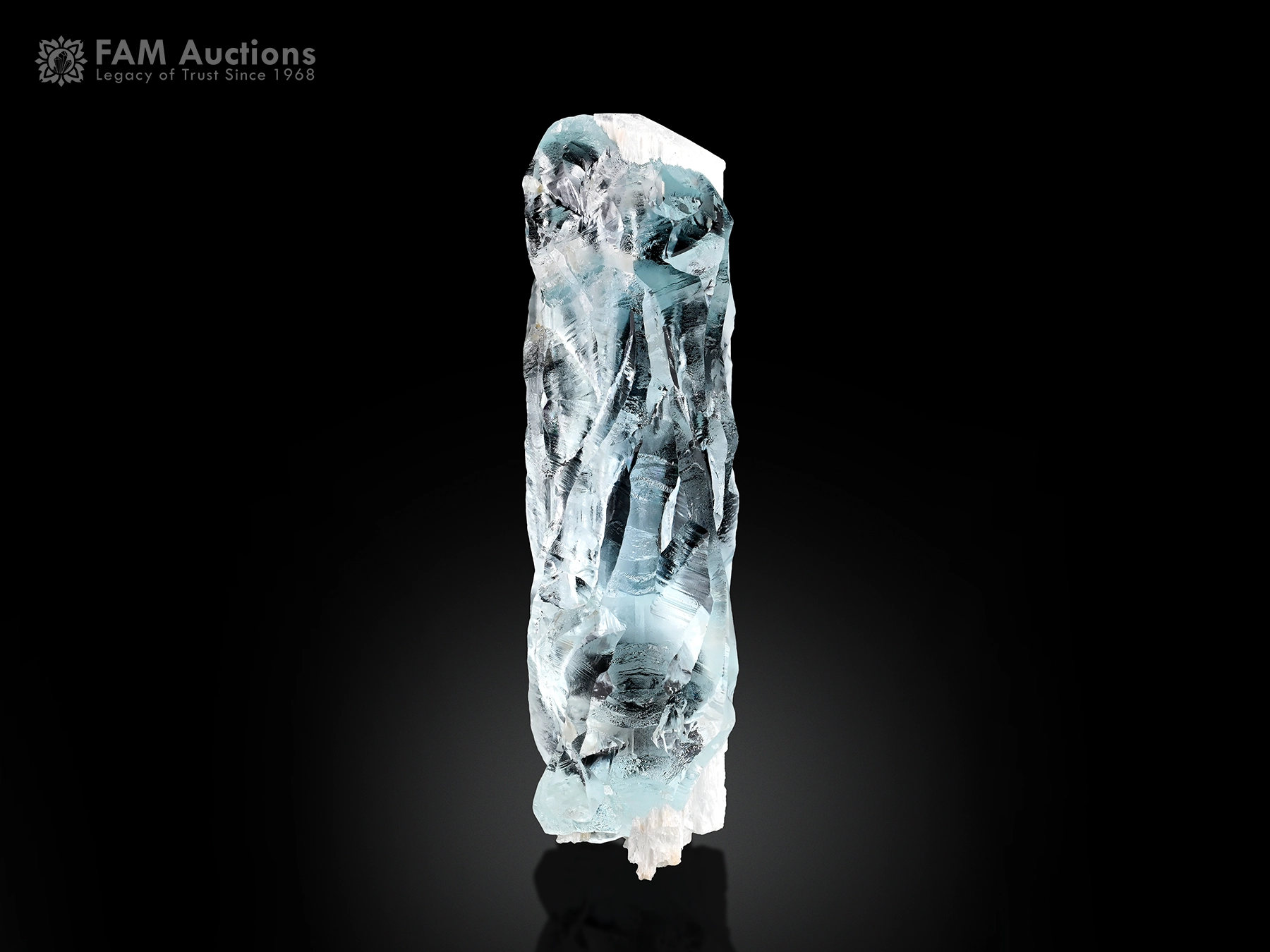 Etched aquamarine crystal Fine blue etched aquamarine crystal with intricate natural surface patterns and bright luster.