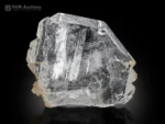 Clear faden quartz crystal with sharp faces and visible internal faden structure