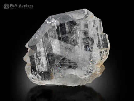 Clear faden quartz crystal with sharp faces and visible internal faden structure