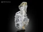 Faden quartz crystal with sharp terminations, bright luster, and visible internal faden line.