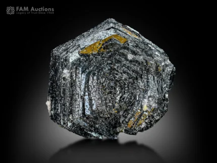 well-structured hematite crystal with metallic luster and reflective steel-gray surface