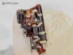 Brown vesuvianite idocrase crystals with white calcite