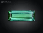 Untreated green emerald cut tourmaline weighing 3.30 carats from Afghanistan