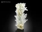 Elongated aragonite specimen with sharp needle-like crystals and subtle chrysocolla from Pakistan.