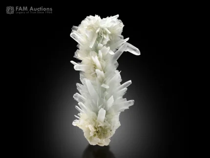 Elongated aragonite specimen with sharp needle-like crystals and subtle chrysocolla from Pakistan.