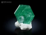 Vibrant green beryl var. emerald crystal on white matrix from Swat, Pakistan.