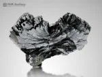 Glossy dark green bow-tie epidote with radiating fan-like crystal growth from Pakistan.
