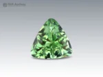Beautiful 3-carat olive green Tourmaline gemstone from Afghanistan featuring a precision trillion cut, rich green color, excellent clarity, and brilliant faceting.