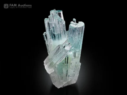 Beautiful cluster of transparent sky-blue aquamarine crystals featuring sharp terminations, brilliant luster, and natural vertical striations.