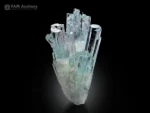 Beautiful cluster of transparent sky-blue aquamarine crystals featuring sharp terminations, brilliant luster, and natural vertical striations.