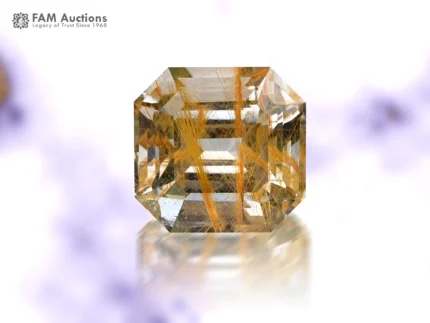 Stunning 47 carat golden rutile included quartz gemstone featuring an elegant Asscher cut and beautiful natural golden rutile inclusions from Pakistan.