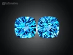 Matched pair of vibrant Swiss Blue Topaz gemstones featuring elegant fancy cushion cuts, brilliant faceting, vivid blue color, and excellent sparkle.