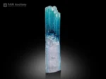 Beautiful color-zoned Tourmaline crystal featuring vibrant sky-blue and delicate lilac tones, prominent vertical striations, and attractive translucency.