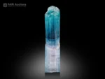 Beautiful color-zoned Tourmaline crystal featuring vibrant sky-blue and delicate lilac tones, prominent vertical striations, and attractive translucency.