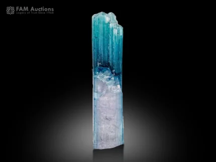 Beautiful color-zoned Tourmaline crystal featuring vibrant sky-blue and delicate lilac tones, prominent vertical striations, and attractive translucency.